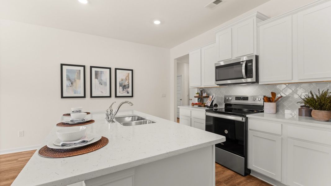 Furnished interior in a model home at Champion's Run in Lithonia (Image 20).