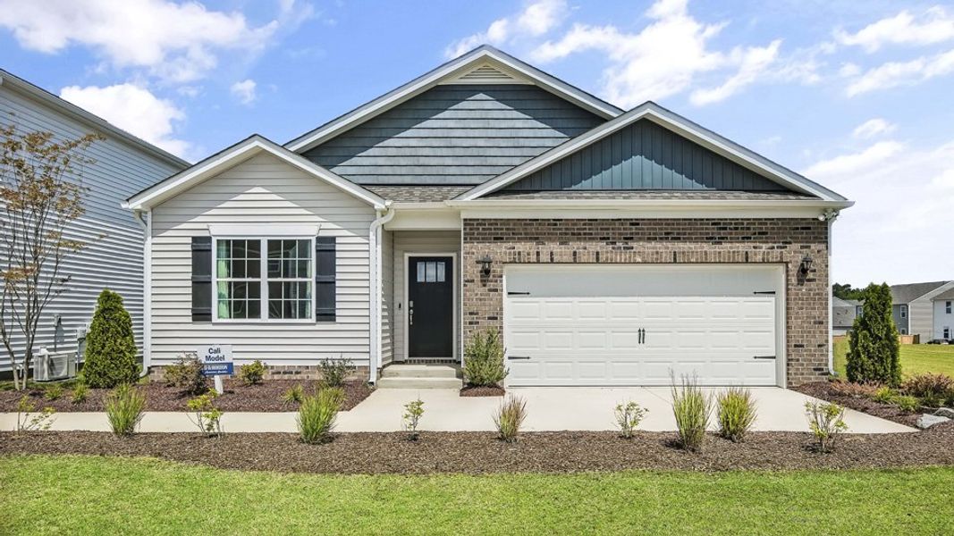 Front exterior of a home in the The Reserve at Prestleigh community, located in Wake Forest, NC (Image 14).