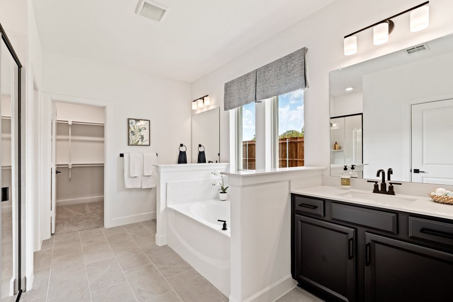 Furnished interior in a model home at Saratoga in Aubrey (Image 8).