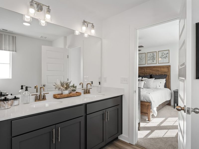 Furnished interior in a model home at The Towns at Red River in Gallatin (Image 16).