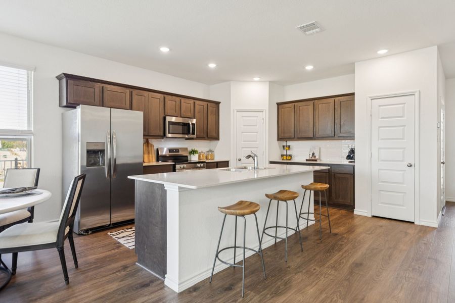 Furnished interior in a model home at Eagle Cove in Denton (Image 7).