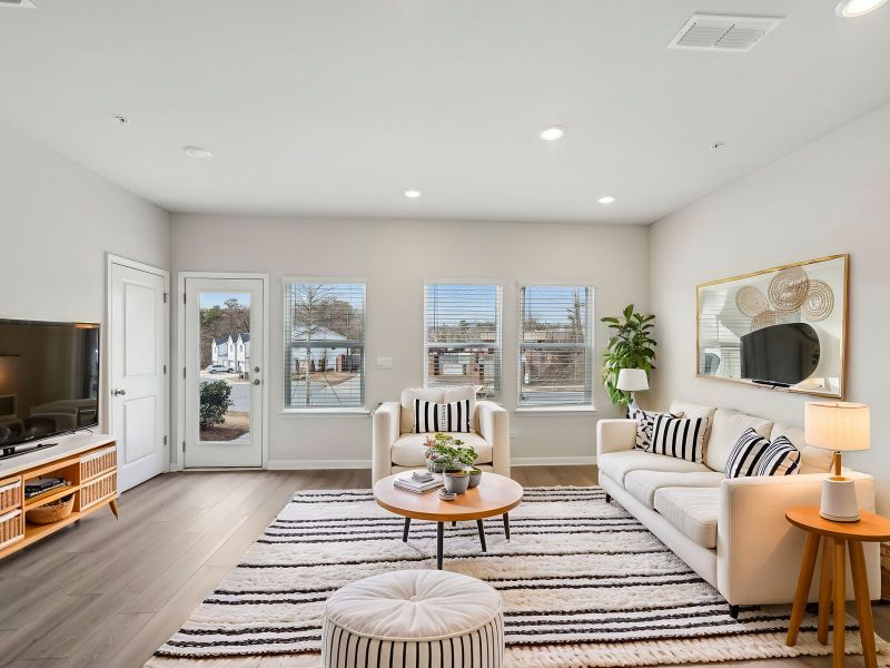 Furnished interior in a model home at Brooks Lake in Loganville (Image 3).