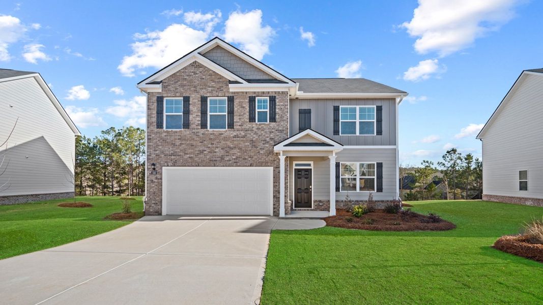 Front exterior of a home in the Cedar Ridge - Locust Grove Station community, located in Locust Grove, GA (Image 4). Front exterior of a home in the Cedar Ridge - Locust Grove Station community, located in Locust Grove, GA (Image 4).