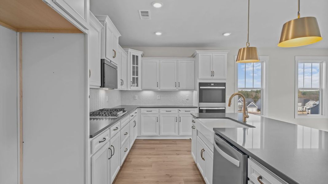 Kitchen in a blue and grey townhome