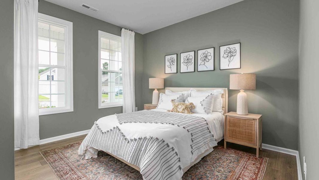 Furnished interior in a model home at Quarry Hills - Freedom in Swepsonville (Image 16).