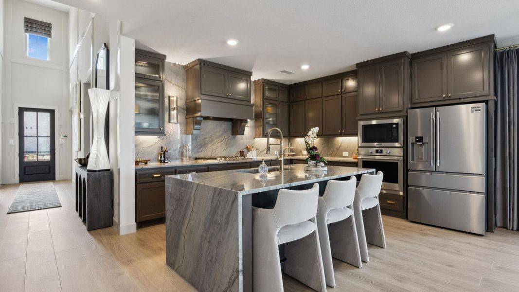 Furnished interior in a model home at Painted Tree - Woodland West in McKinney (Image 27).