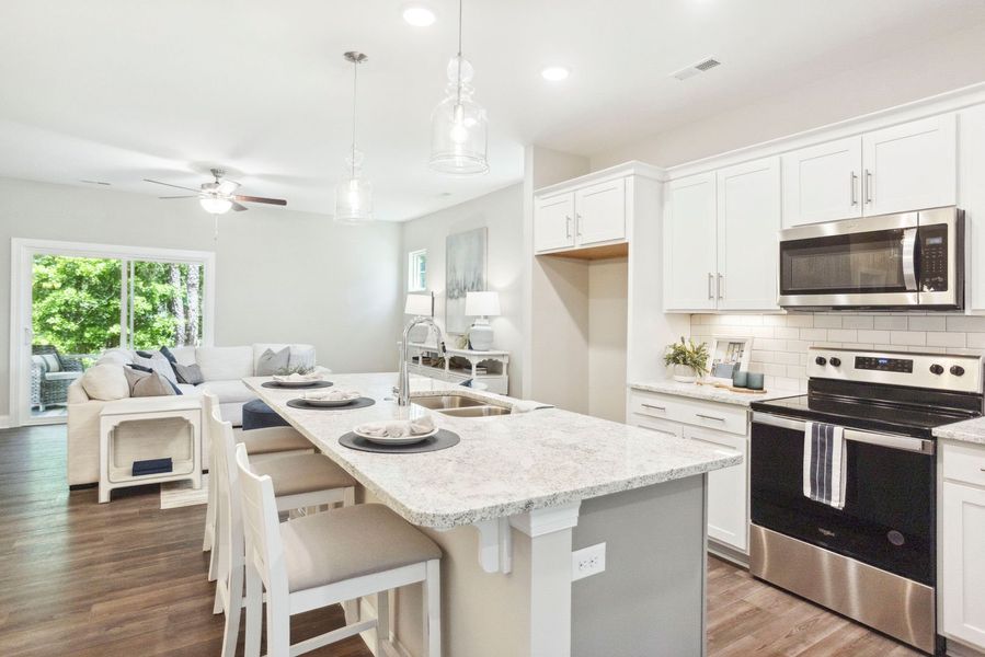 Furnished interior in a model home at Rourk Woods in Shallotte (Image 11).