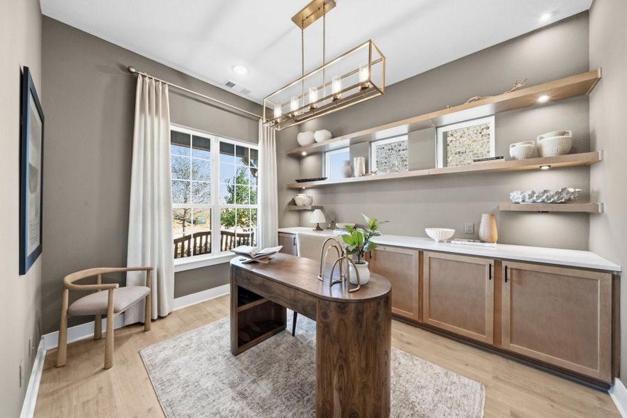 Furnished interior in a model home at Chaparral Park in Oak Point (Image 30).