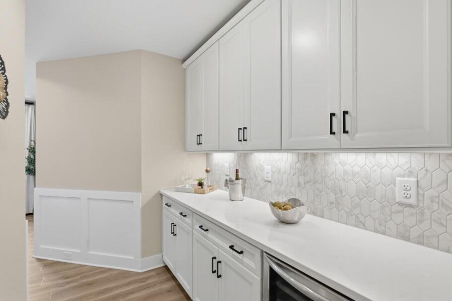 Furnished interior in a model home at Rock Creek in Denver (Image 33).