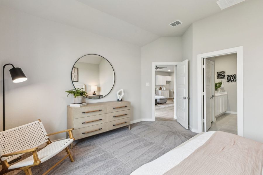 REPRESENTATIVE PHOTO – Primary Suite in a Lakehaven Oak model home in Farmersville TX by Trophy Signature Homes
