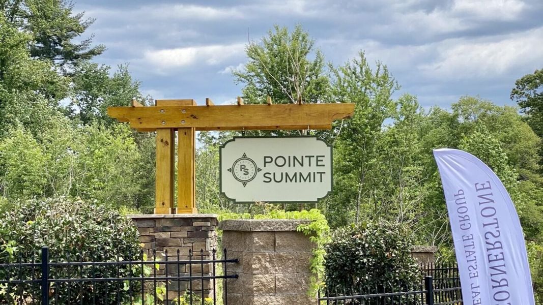 Entrance to the Pointe Summit community in Slater-Marietta, SC, featuring signage and landscaping (Image 1). Entrance to the Pointe Summit community in Slater-Marietta, SC, featuring signage and landscaping (Image 1).