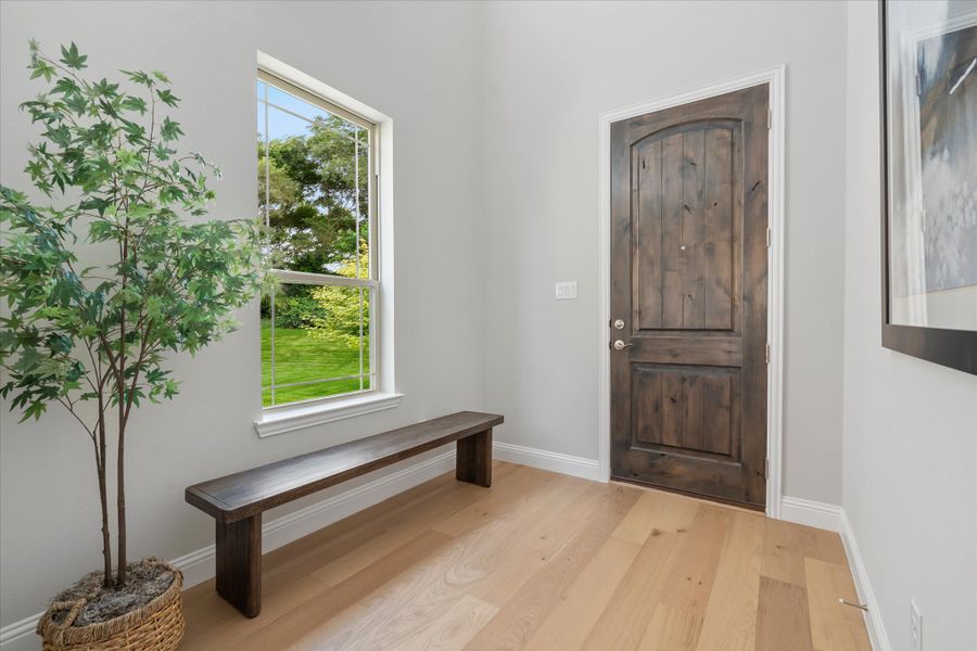 Furnished interior in a model home at Villas at Long Branch in Rowlett (Image 5).