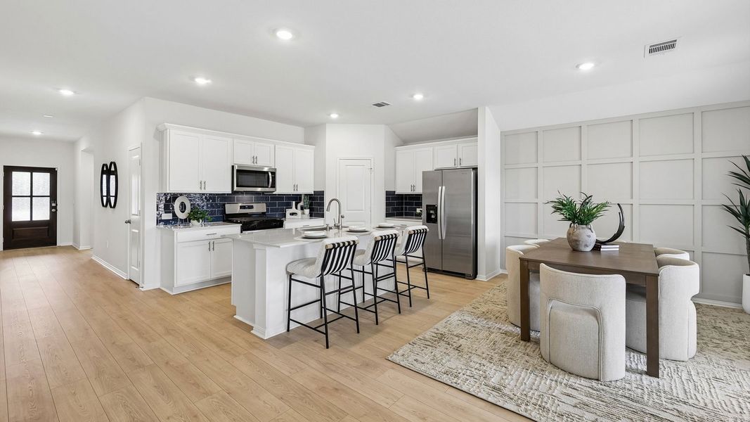 Furnished interior in a model home at Bar W Ranch in Leander (Image 8).