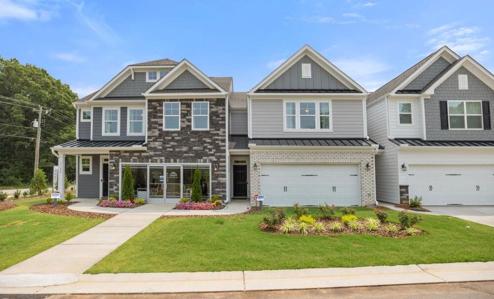 Front exterior of a home in the Villas at Dawsonville Townhomes community, located in Dawsonville, GA (Image 2). Front exterior of a home in the Villas at Dawsonville Townhomes community, located in Dawsonville, GA (Image 2).