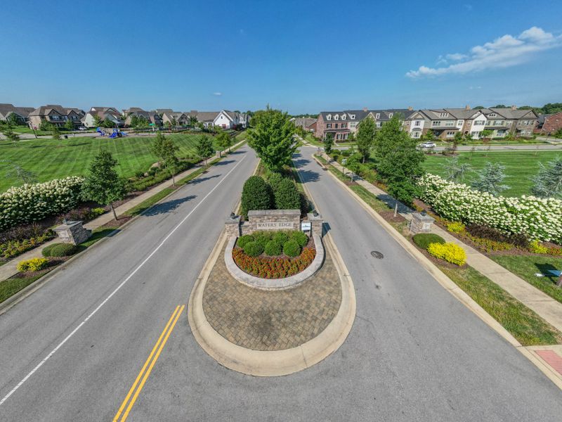 Entrance to the Waters Edge community in Franklin, TN, featuring signage and landscaping (Image 15).