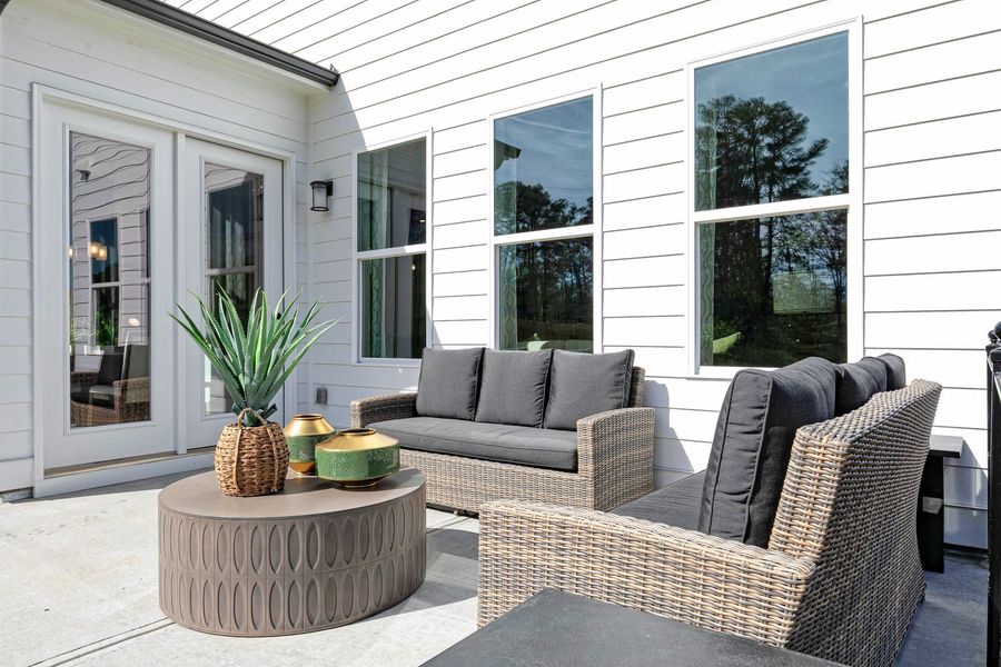 Extend your living space outdoors on the rear patio, perfect for relaxing or entertaining Extend your living space outdoors on the rear patio, perfect for relaxing or entertaining