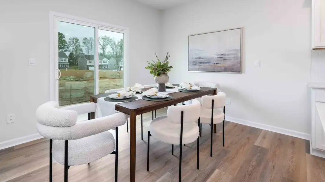Furnished interior in a model home at Sweetwater Village in Rockwell (Image 11).