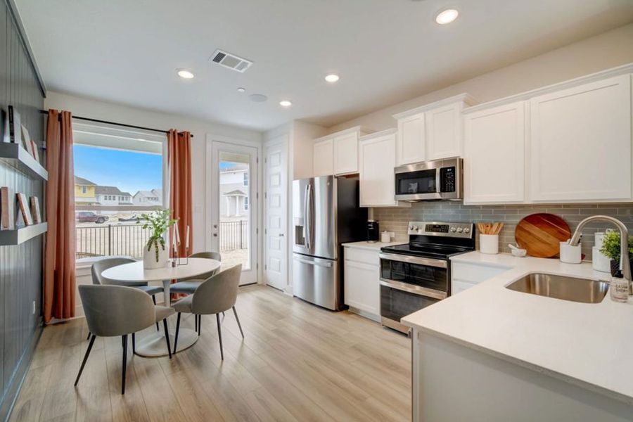 Furnished interior in a model home at Avery Centre in Round Rock (Image 38).