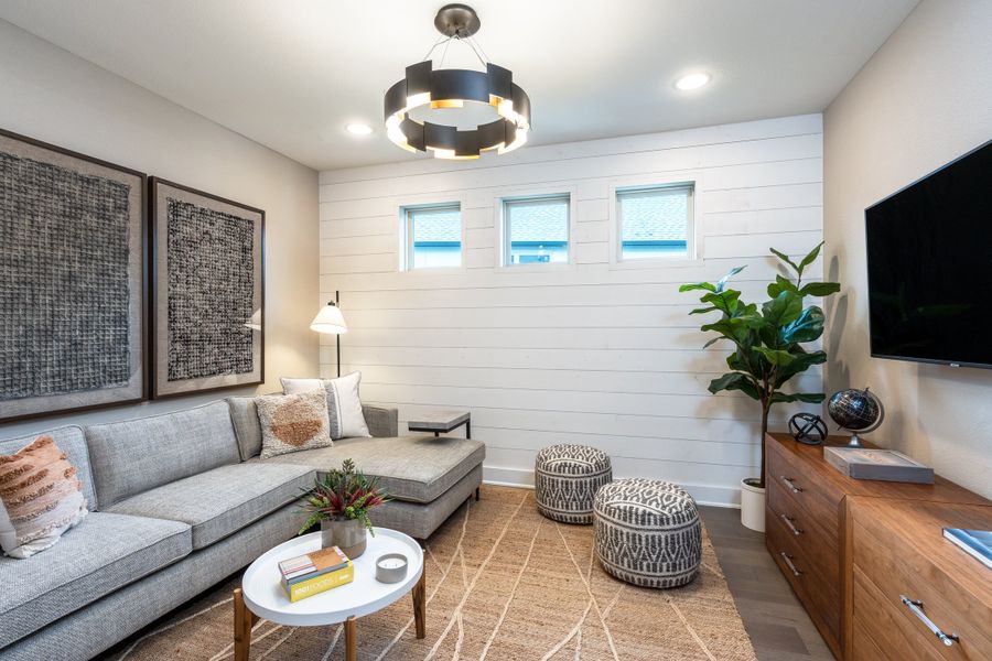 Furnished interior in a model home at Travisso Capri in Leander (Image 11).
