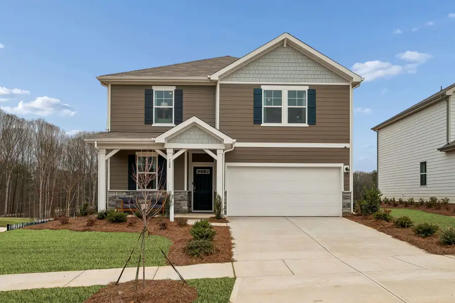 A house with a garage. A house with a garage.