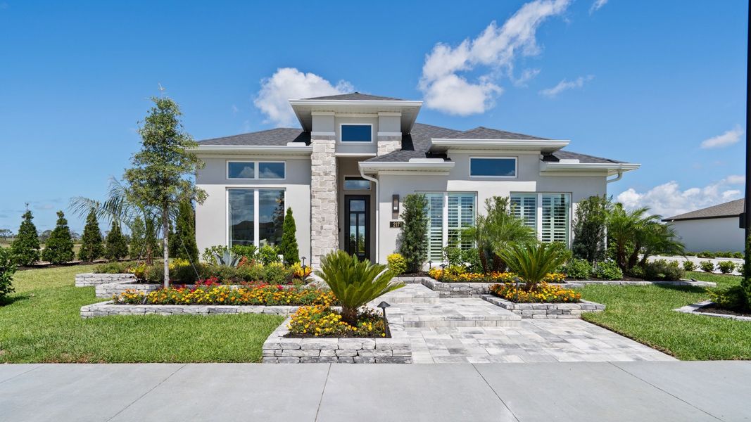 Front exterior of a home in the Magnolia Bay 50' community, located in Nokomis, FL (Image 4).