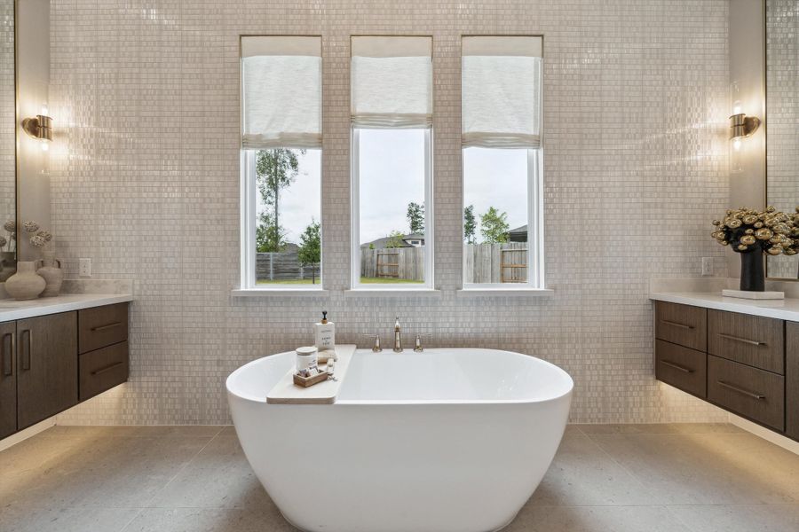Furnished interior in a model home at ARTAVIA® - 65' Art in Conroe (Image 21).