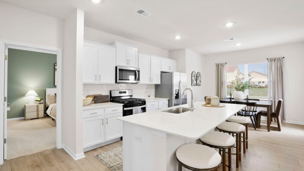Furnished interior in a model home at Benjamin's Grove in Woodruff (Image 19).