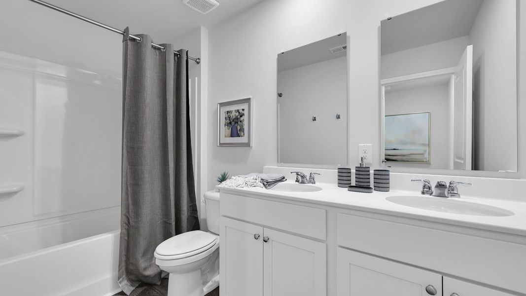 Furnished interior in a model home at The Ranch in Holly Hill (Image 32).