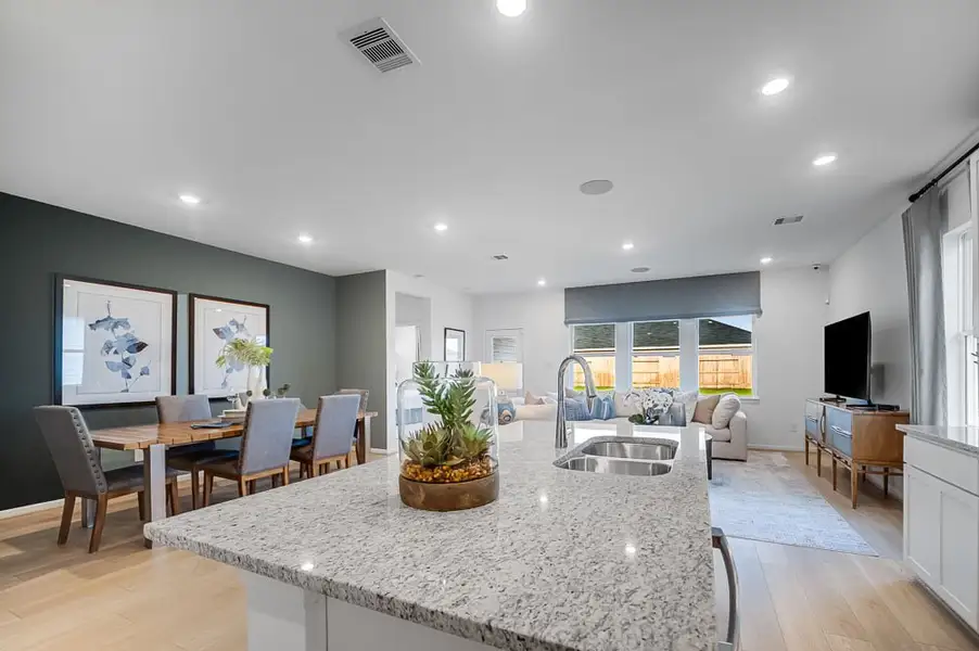 Furnished interior in a model home at Raburn Reserve 50s in Tomball (Image 10).