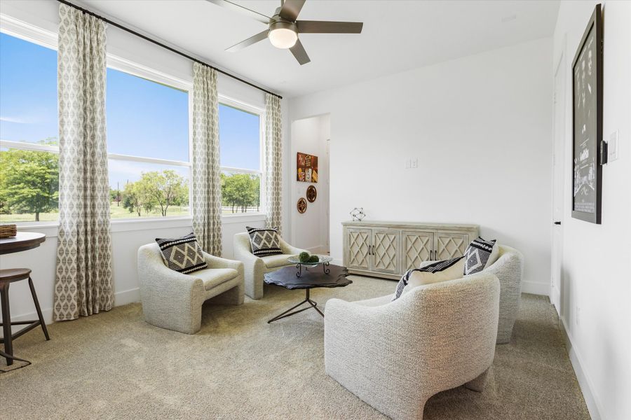 Furnished interior in a model home at Rolling Creek Ranch in Aledo (Image 16).