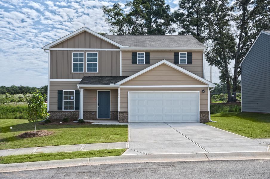 A house with a garage. A house with a garage.