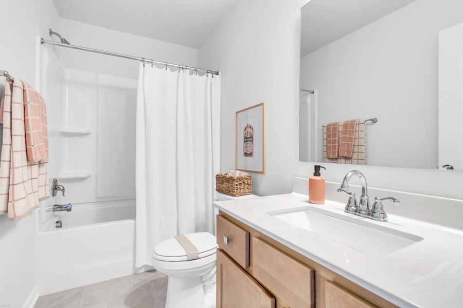 Furnished interior in a model home at Reeves Crossing in St. George (Image 21).