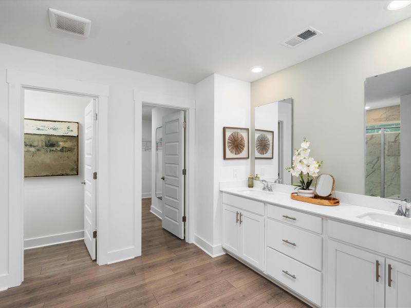 Furnished interior in a model home at The Coves at Lakes of Cane Bay in Summerville (Image 30). Furnished interior in a model home at The Coves at Lakes of Cane Bay in Summerville (Image 30).