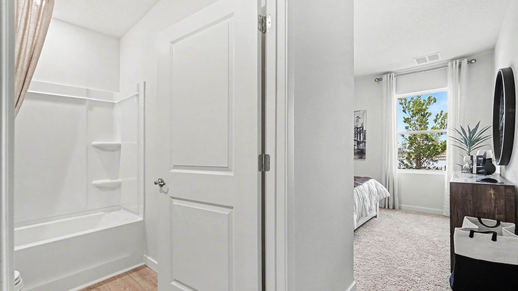 Furnished interior in a model home at Cypress Bay West in Palm Bay (Image 21).