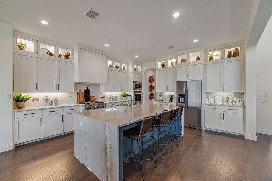Furnished interior in a model home at King's Crossing in Parker (Image 5).