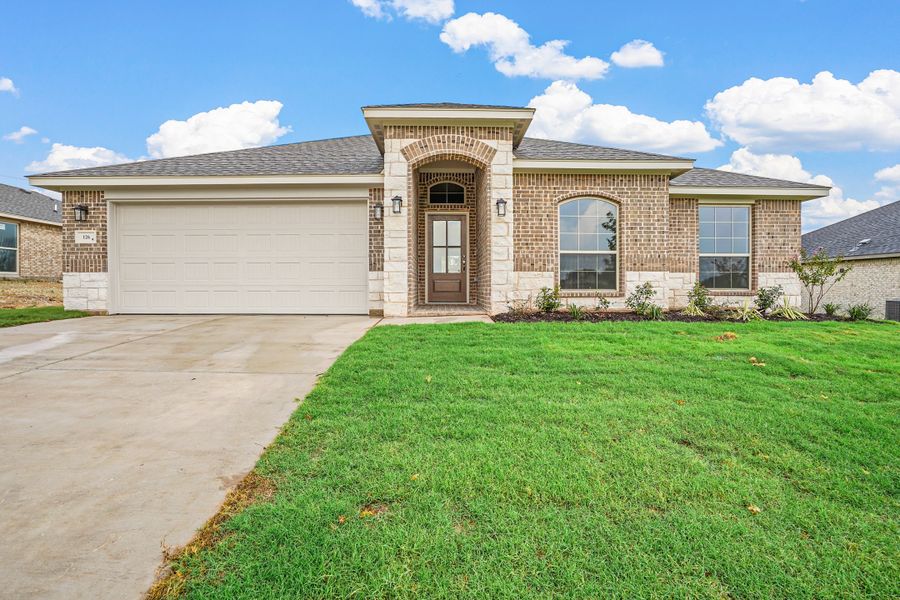 Front exterior of a home in the Stoneview community, located in Glen Rose, TX (Image 2).