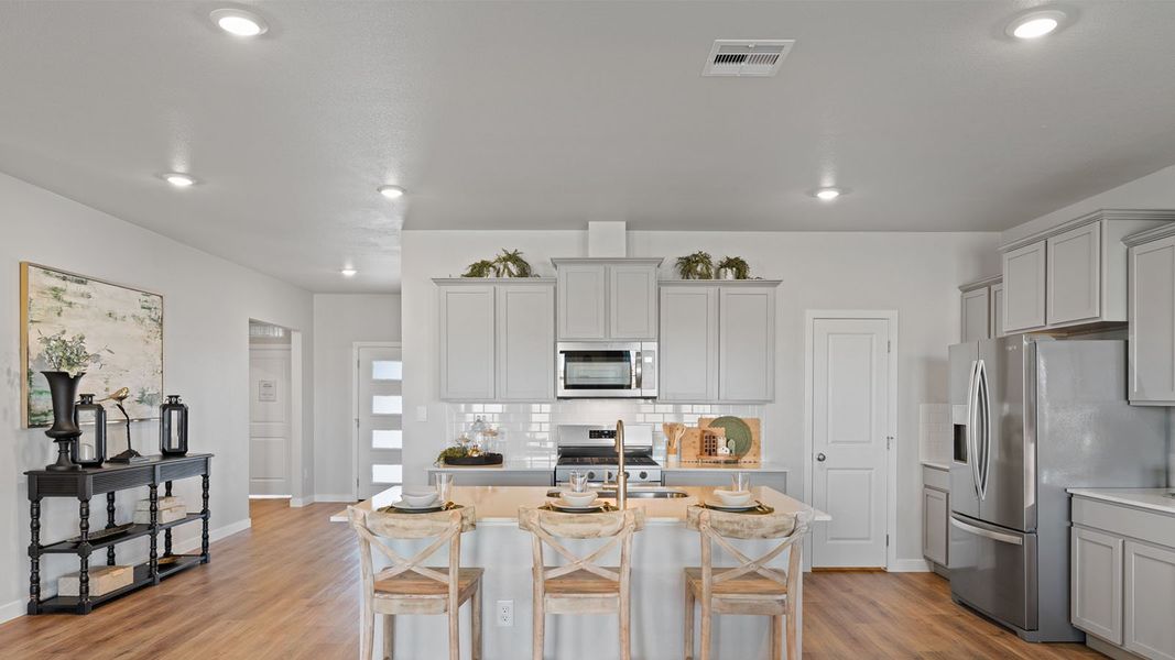 Furnished interior in a model home at King's Landing in Corpus Christi (Image 2).