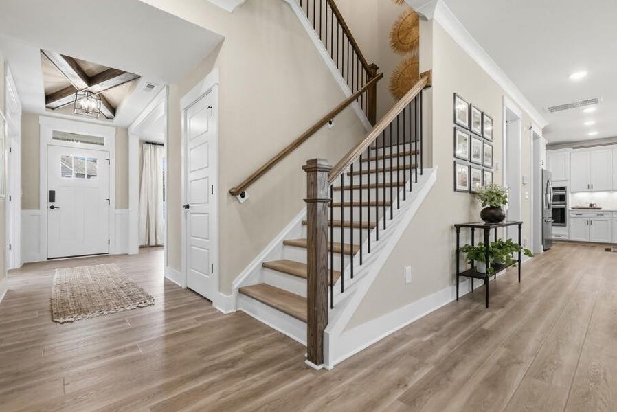 Furnished interior in a model home at Rock Creek in Denver (Image 37).