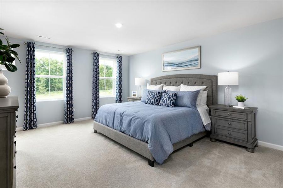 Enjoy a spacious owner's suite designed for comfort and relaxation.