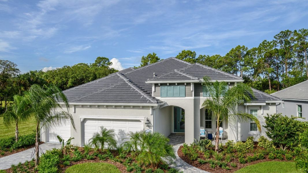 Front exterior of a home in the Grand Palm Real Estate and Homes for Sale in Venice, FL - Neal Communities community, located in Venice, FL (Image 6). Front exterior of a home in the Grand Palm Real Estate and Homes for Sale in Venice, FL - Neal Communities community, located in Venice, FL (Image 6).