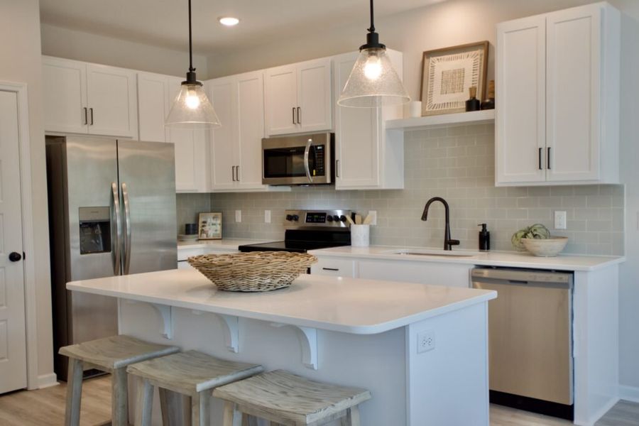 Furnished interior in a model home at Bell Meadows in Winnabow (Image 9).