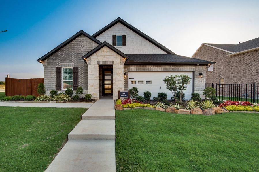 Front exterior of a home in the Northstar community, located in Haslet, TX (Image 11).