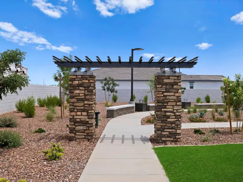 Entrance to the Allure Vista Reserve Series community in Buckeye, AZ, featuring signage and landscaping (Image 1). Entrance to the Allure Vista Reserve Series community in Buckeye, AZ, featuring signage and landscaping (Image 1).