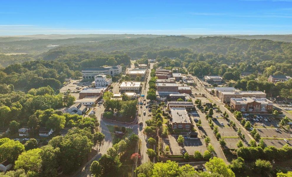 Aerial view of the Canton Overlook Townhomes community in Canton, GA, showing layout and nearby surroundings (Image 5). Aerial view of the Canton Overlook Townhomes community in Canton, GA, showing layout and nearby surroundings (Image 5).