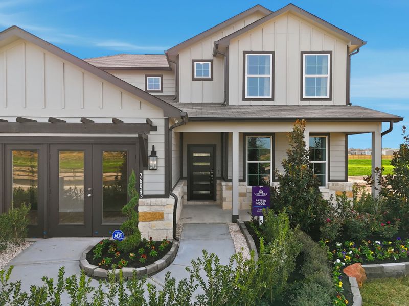 A house with a front yard. A house with a front yard.