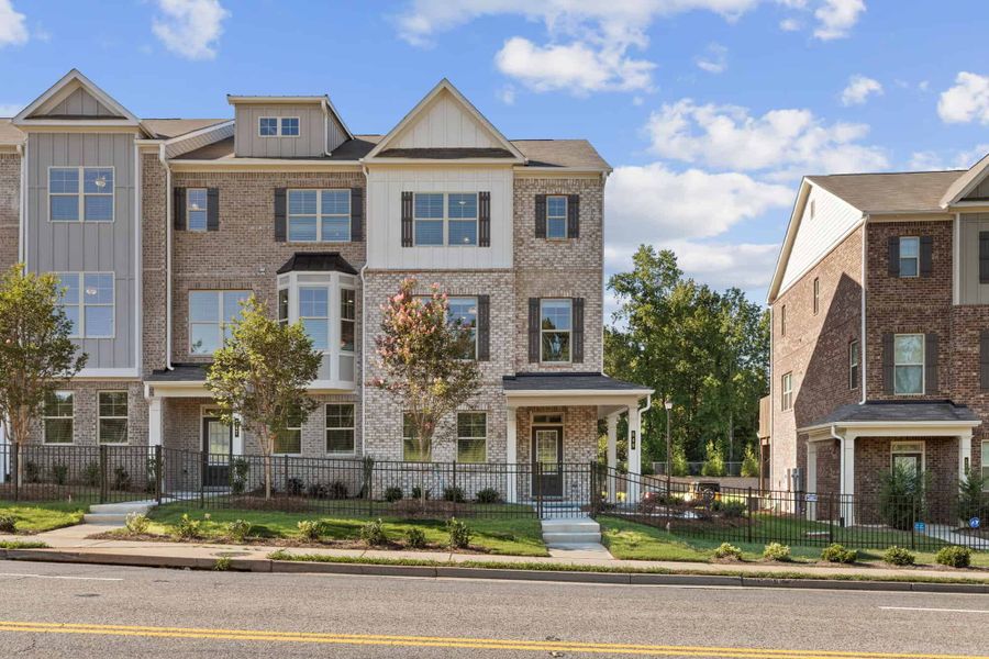 Front exterior of a home in the Towns at Enclave community, located in Lawrenceville, GA (Image 2). Front exterior of a home in the Towns at Enclave community, located in Lawrenceville, GA (Image 2).