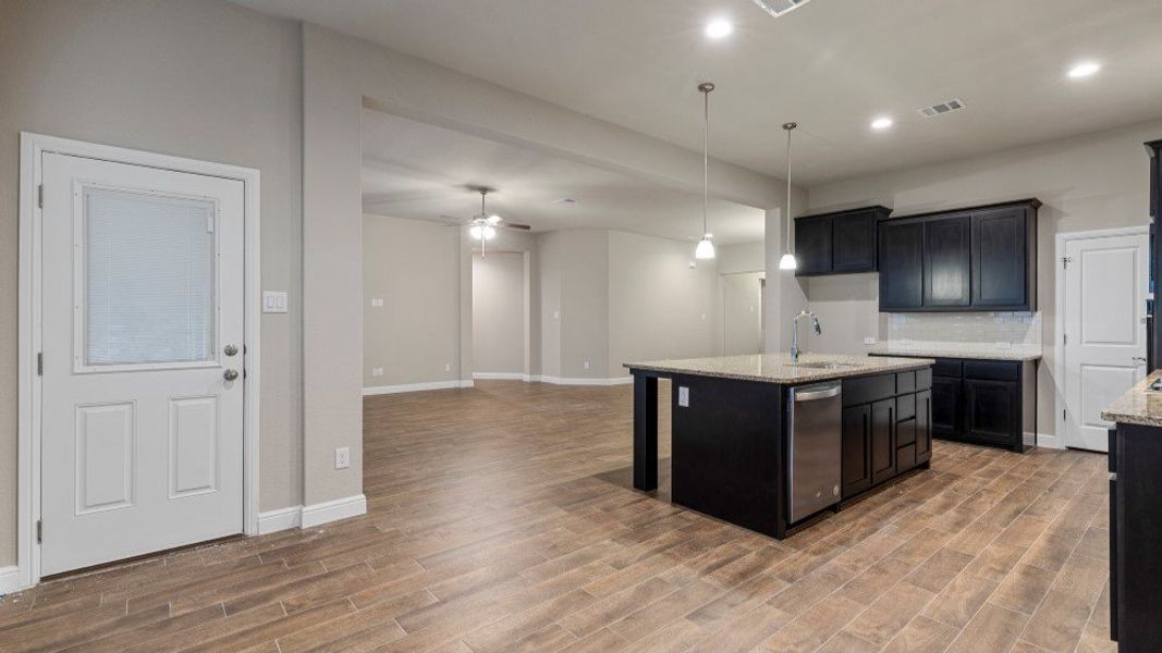 Furnished interior in a model home at Eden Ranch in Arlington (Image 26).
