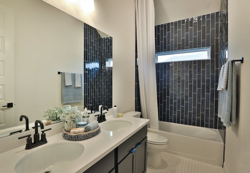 Furnished interior in a model home at Brewster Pointe in College Station (Image 14). Furnished interior in a model home at Brewster Pointe in College Station (Image 14).