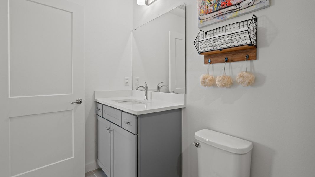 Trinity Place Staged Model Ambersweet Loft Bathroom by DRB Homes in Saint Cloud FL Trinity Place Staged Model Ambersweet Loft Bathroom by DRB Homes in Saint Cloud FL