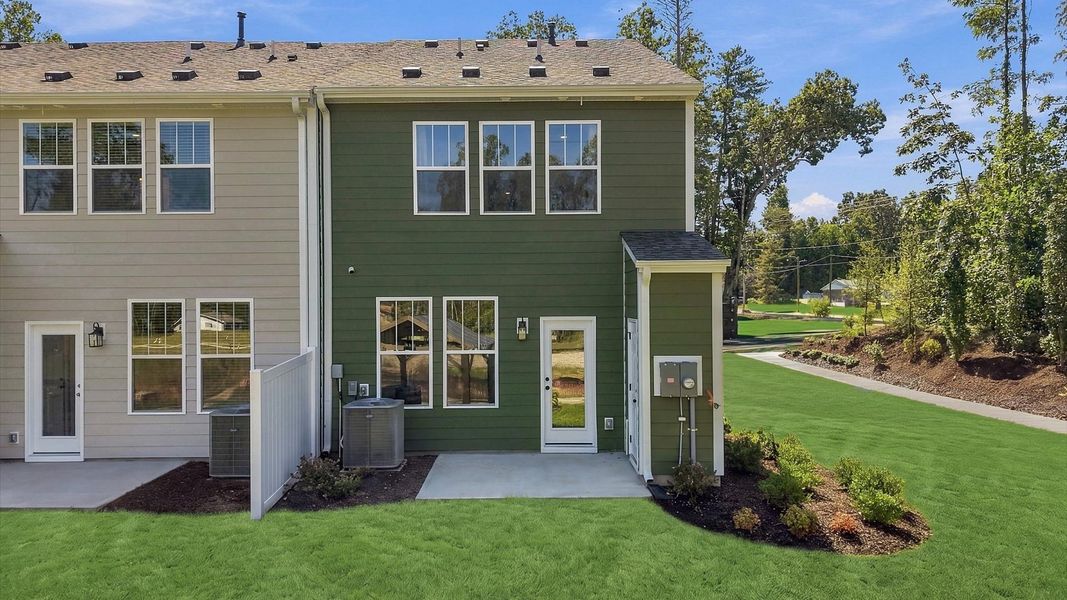 Superior curb appeal continues to the back with a refined and private backyard space at the new Brookland Place community